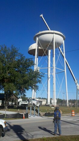 Workers begin demolition of one of Joint Base Charleston - Air Base's three water towers Dec. 2. The water tower on Davis Drive, across from the Civil Engineer Squadron compound, was removed as part of the Airfield Obstruction Reduction Initiative and  to reduce excess infrastructure on the installation. (U.S. Air Force photo/Paula Lesiak)

 
