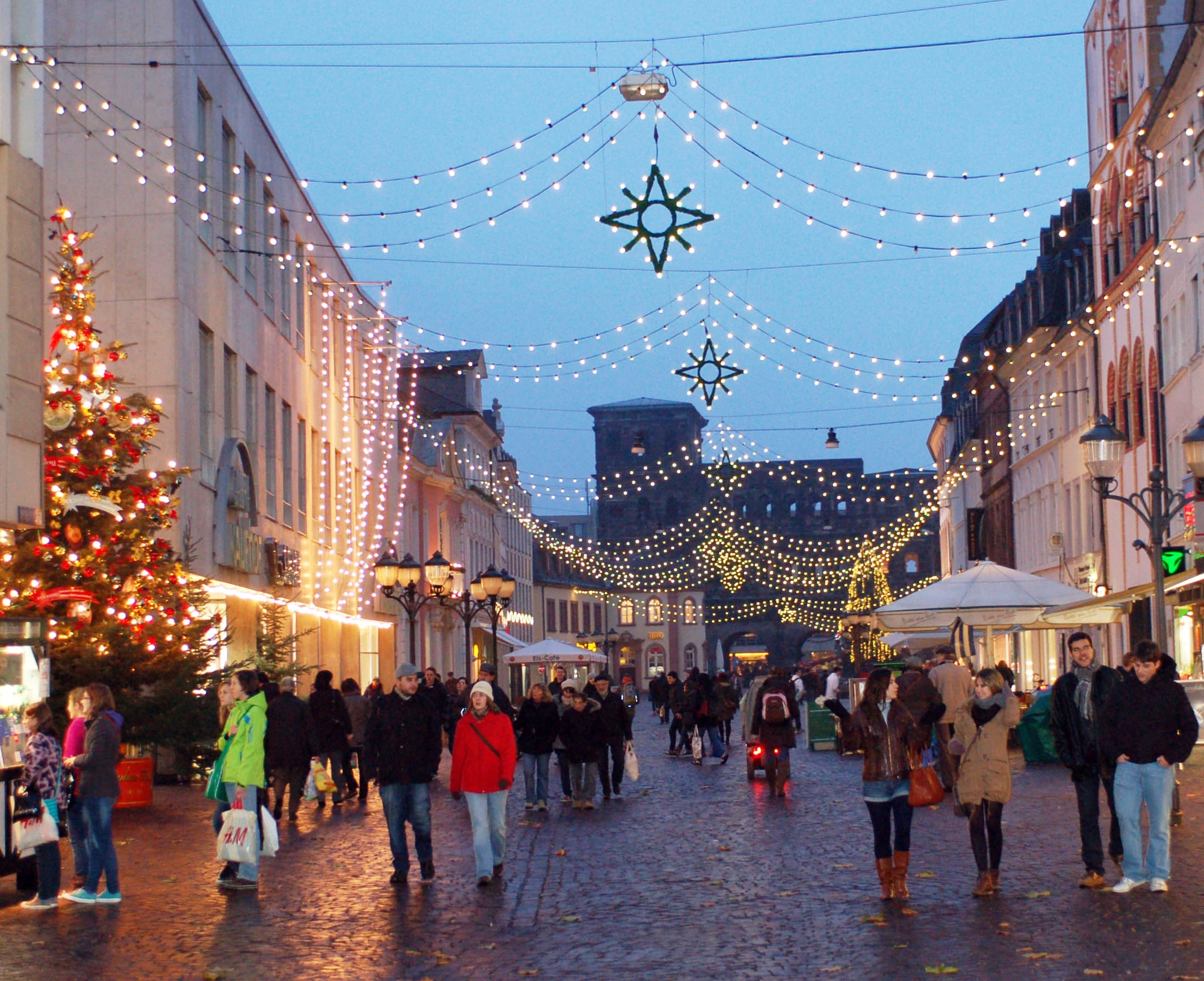 SPANGDAHLEM AIR BASE, Germany -- Visitors shop during the Trier Weihnachtsmarkt Dec. 8 in the main market square in Trier. The market is going on now through Dec. 22. Opening times are 10:30 a.m. - 8:30 p.m. Monday through Wednesday, 10:30 a.m. -9:30 p.m. Thursday through Saturday, and 11 a.m. - 8:30 p.m. Sunday. Highlights include a performance by the U.S. Air Forces in Europe Brass Band from 6 - 7 p.m. Dec. 13. Music and entertainment is scheduled throughout each weekend, and Sankt Nikolaus will visit often. (U.S. Air Force photo/Iris Reiff)