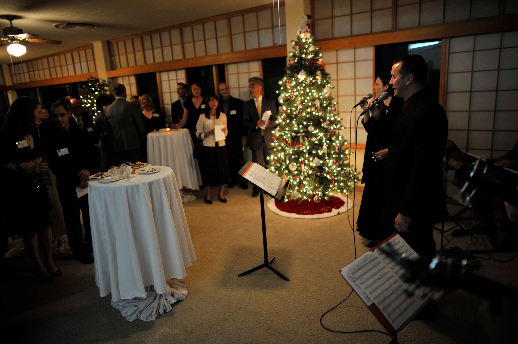 YOKOTA AIR BASE, Japan -- Members of Pacific Trends, a musical combo from the U.S. Air Force Band of the Pacific, Asia, perform at the house of Lt. Gen. Burton Field, U.S. Forces, Japan, and 5th Air Force commander, at Yokota Air Base, Japan, Dec. 3, 2011. Field held a holiday open house with U.S. and Japanese dignitaries to bolster bilateral relations with Japan. (U.S. Air Force photo/Staff Sgt. Samuel Morse)
