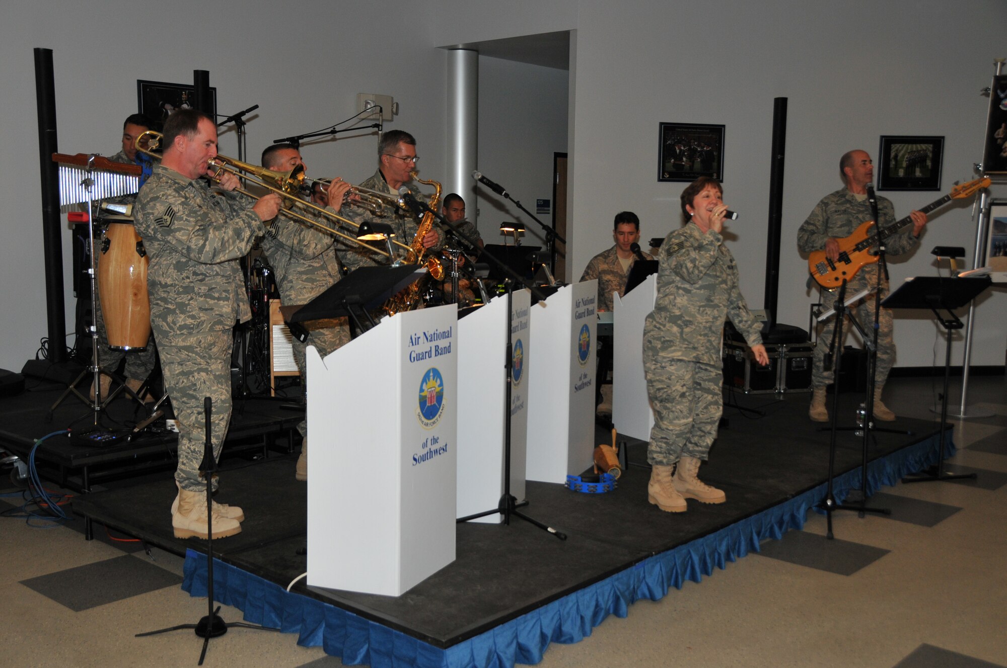 The 562 AF Band provided a variety of music during a "Combat Dinner" where guests were served food prepared from a mobile dining facility.The event was in support of Lt. Gen. Harry M. Wyatt III, director of the Air National Guard, who hosted a Business and Industry Days event at the Air Guard's international F-16 training unit.