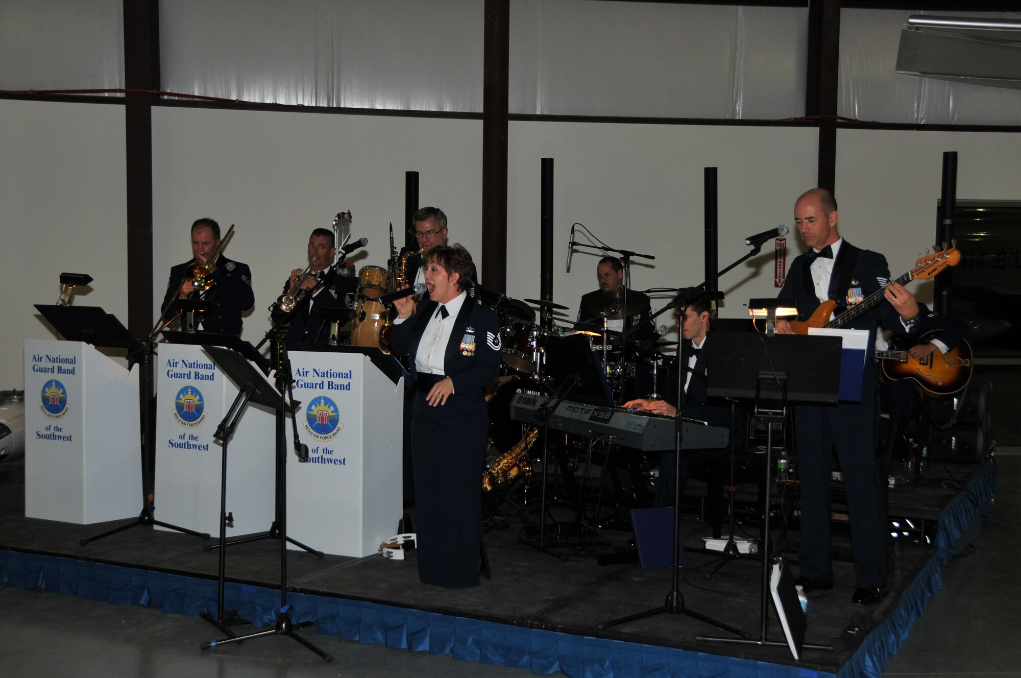 Nine members of the 562 AF Band performs in Tucson Arizona on 26 October to support Lt. Gen. Harry M. Wyatt III, director of the Air National Guard, who hosted a Business and Industry Days event at the Air Guard's international F-16 training unit.