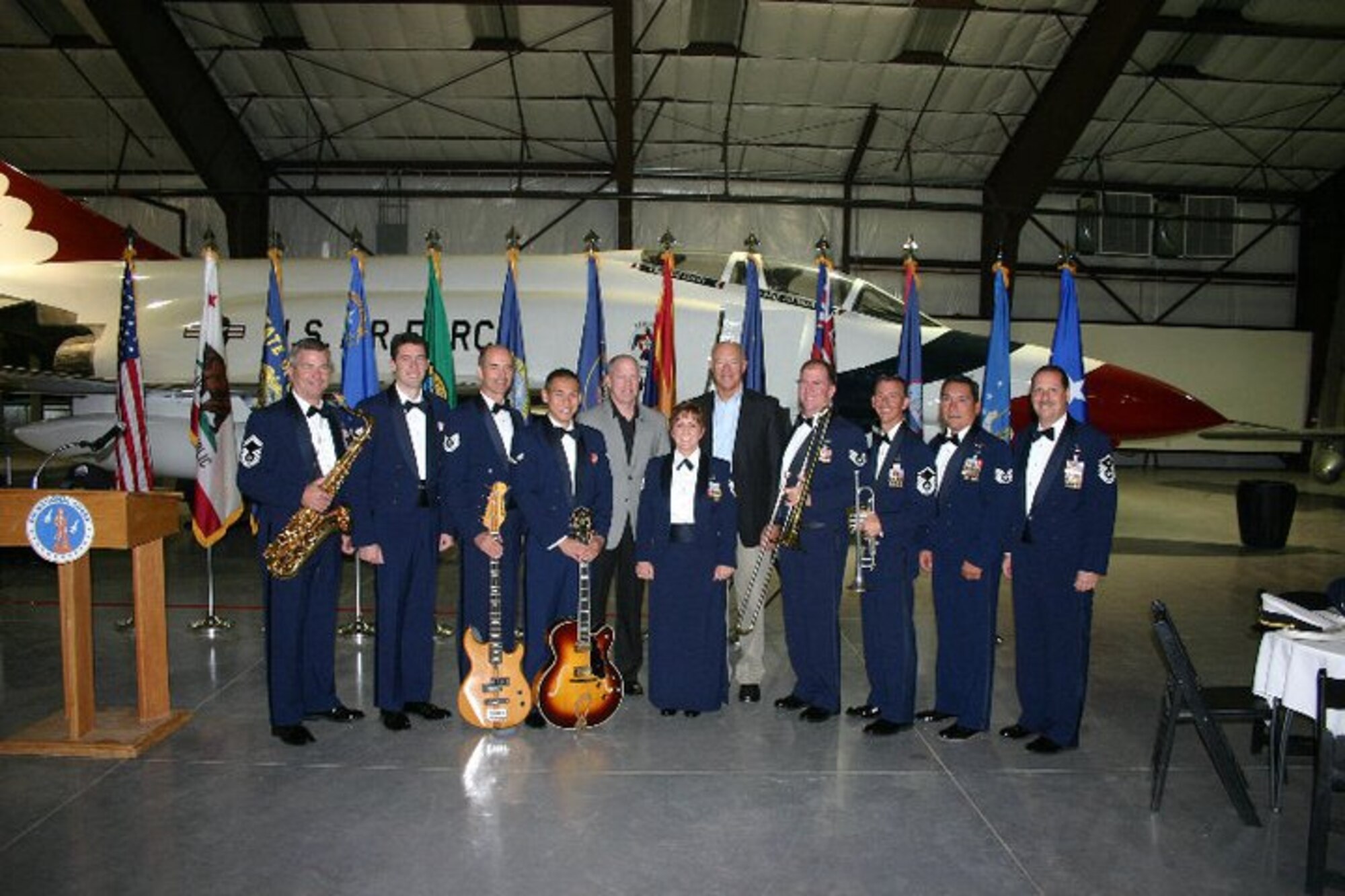 Nine members of the 562 AF Band packed up and headed out to Tucson Arizona on 26 October to support Lt. Gen. Harry M. Wyatt III, director of the Air National Guard, who hosted a Business and Industry Days event at the Air Guard's international F-16 training unit. From Left to right: SMSgt Jurgen Schwarze, Airmen Rich Smith, TSgt Daniel Plaster, Airmen Alex Liu, Command Chief Muncy, TSgt Erin McPherson, Lt Gen Wyatt, SSgt Bob Goodwin, MSgt Gerald Lockwood, TSgt Ken Carillo, MSgt Scott McPherson