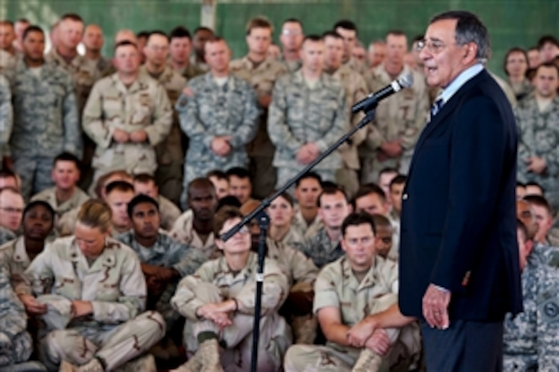 U.S. Defense Secretary Leon E. Panetta speaks to U.S. troops on Camp Lemonnier in Djibouti, Dec. 13, 2011. Panetta thanked each service member for their efforts and sacrifices while also wishing them happy holidays. 