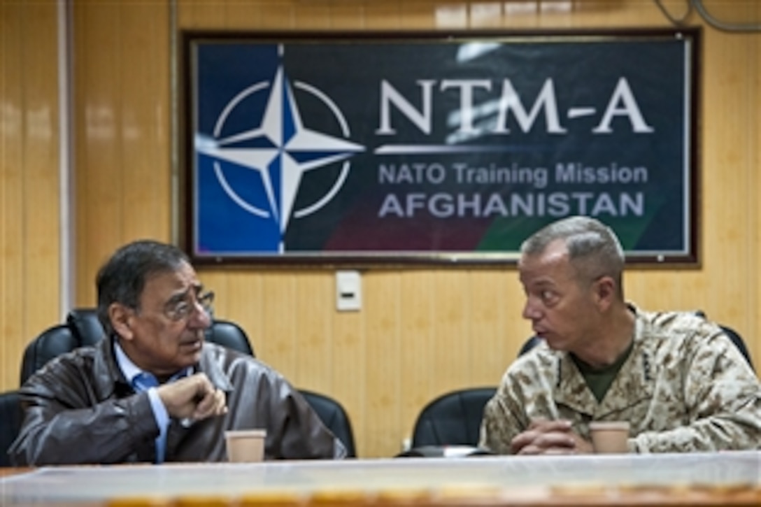 U.S. Defense Secretary Leon E. Panetta listens as U.S. Marine Corps Gen. John R. Allen, commander of U.S. and international forces in Afghanistan, speaks during a meeting in Kabul, Afghanistan, Dec. 13, 2011.