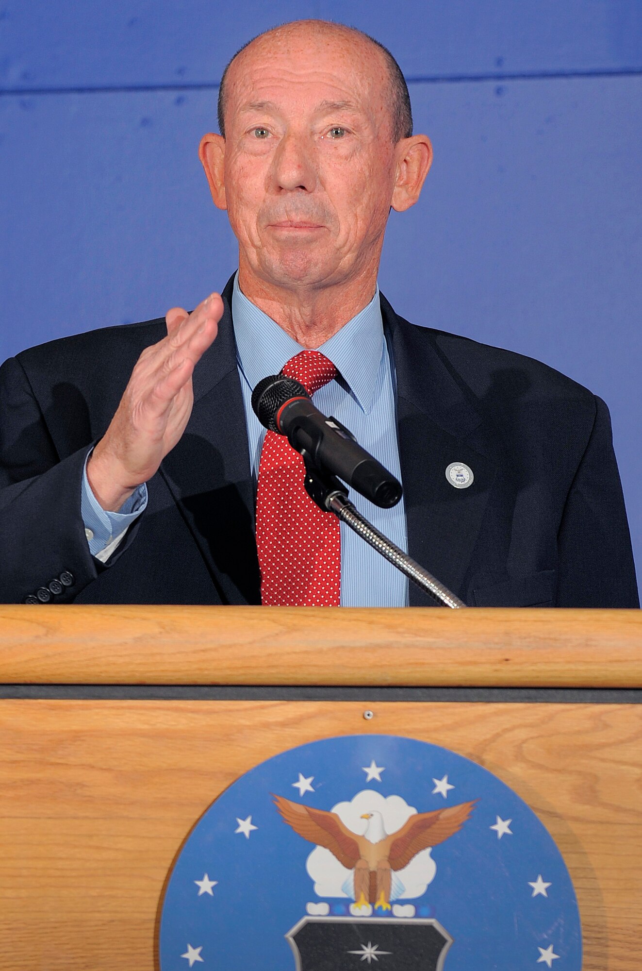 Air Force Academy Athletics Director Dr. Hans Mueh delivers the commencement address at a graduation ceremony for four Class of 2011 graduates in Arnold Hall Dec. 14, 2011. Mueh, a 1966 Academy graduate, delivered the commencement in lieu of Academy Superintendent Lt. Gen. Mike Gould, who could not attend. (U.S. Air Force photo/Raymond McCoy)