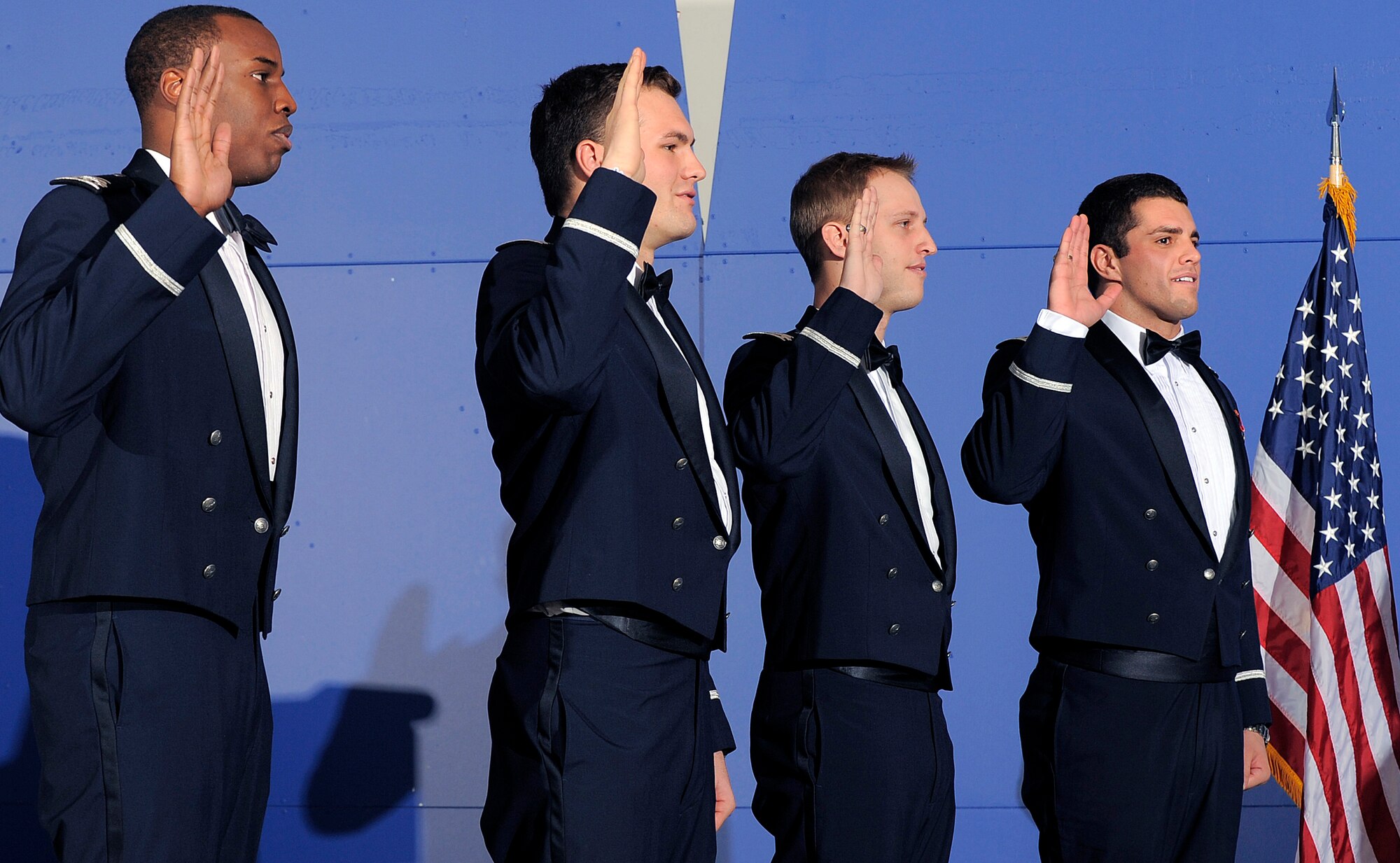 Cadets 1st Class Braylon Gurnell, Patrick Hennessey, Alexander Hess and Kenneth Lamendola swear their oaths of office during a graduation ceremony at the Air Force Academy Dec. 14, 2011. The four are the final additions to the Academy's Class of 2011, which now numbers 1,035. (U.S. Air Force photo/Raymond McCoy)