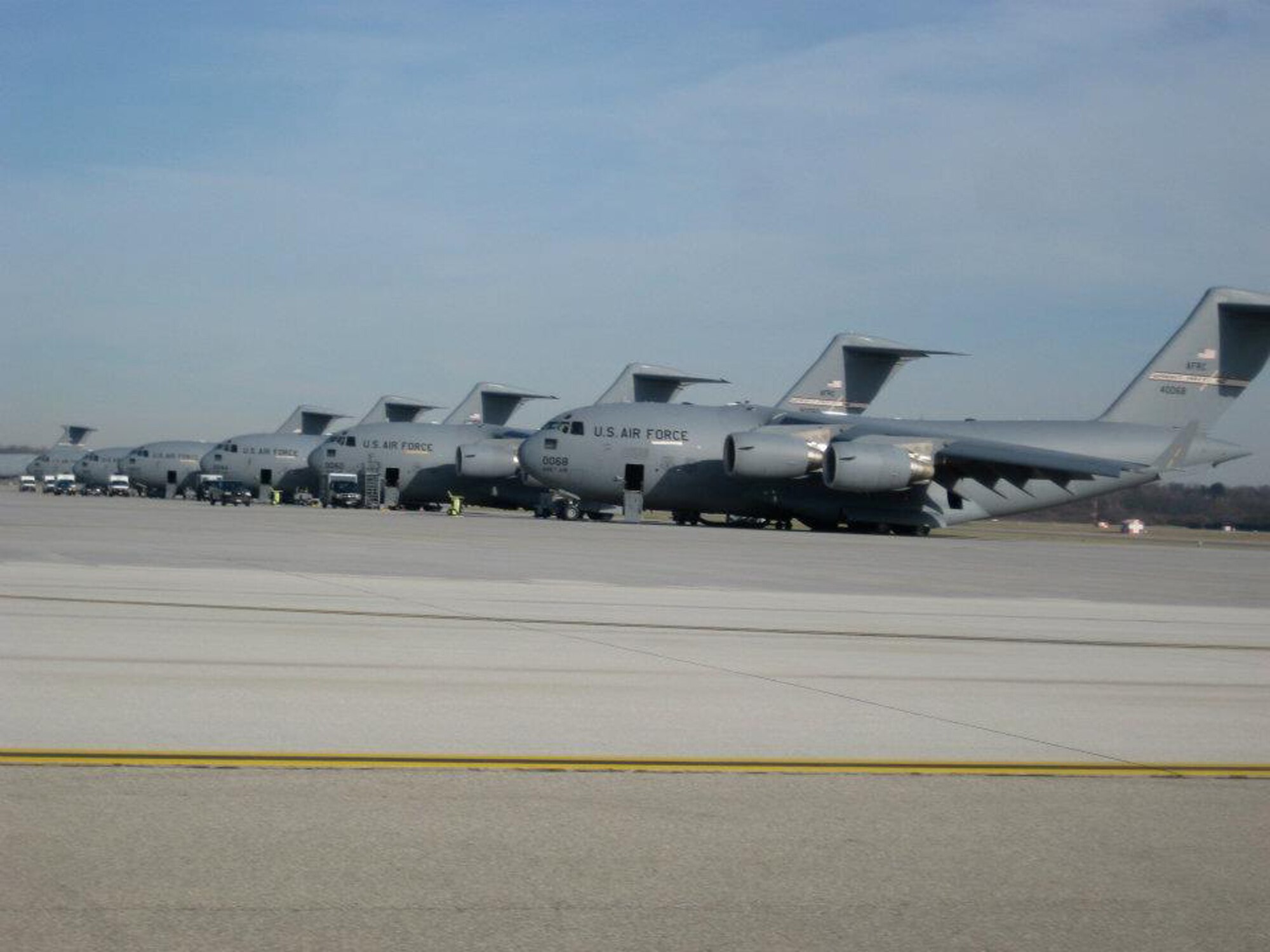 WRIGHT-PATTERSON AIR FORCE BASE, Ohio - Six C-17 Globemaster III aircraft enjoy the Ohio sun Dec. 13 while sitting on the ramp of the 445th Airlift Wing. The wing received it's seventh C-17 Dec. 9. (U.S. Air Force photo/Master Sgt. Larry Stulz) 