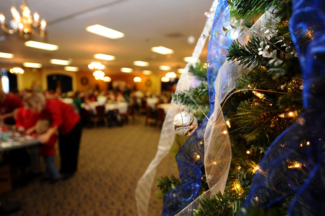 Airmen and their families were invited to have breakfast with Santa at the Dakota’s Club on Ellsworth Air Force Base, S.D., Dec. 3, 2011. The Dakota’s Club offered free breakfast, arts and crafts, face painting, toys and an opportunity to get a picture with Santa. (U.S. Air Force photo by Airman 1st Class Zachary Hada/Released)
