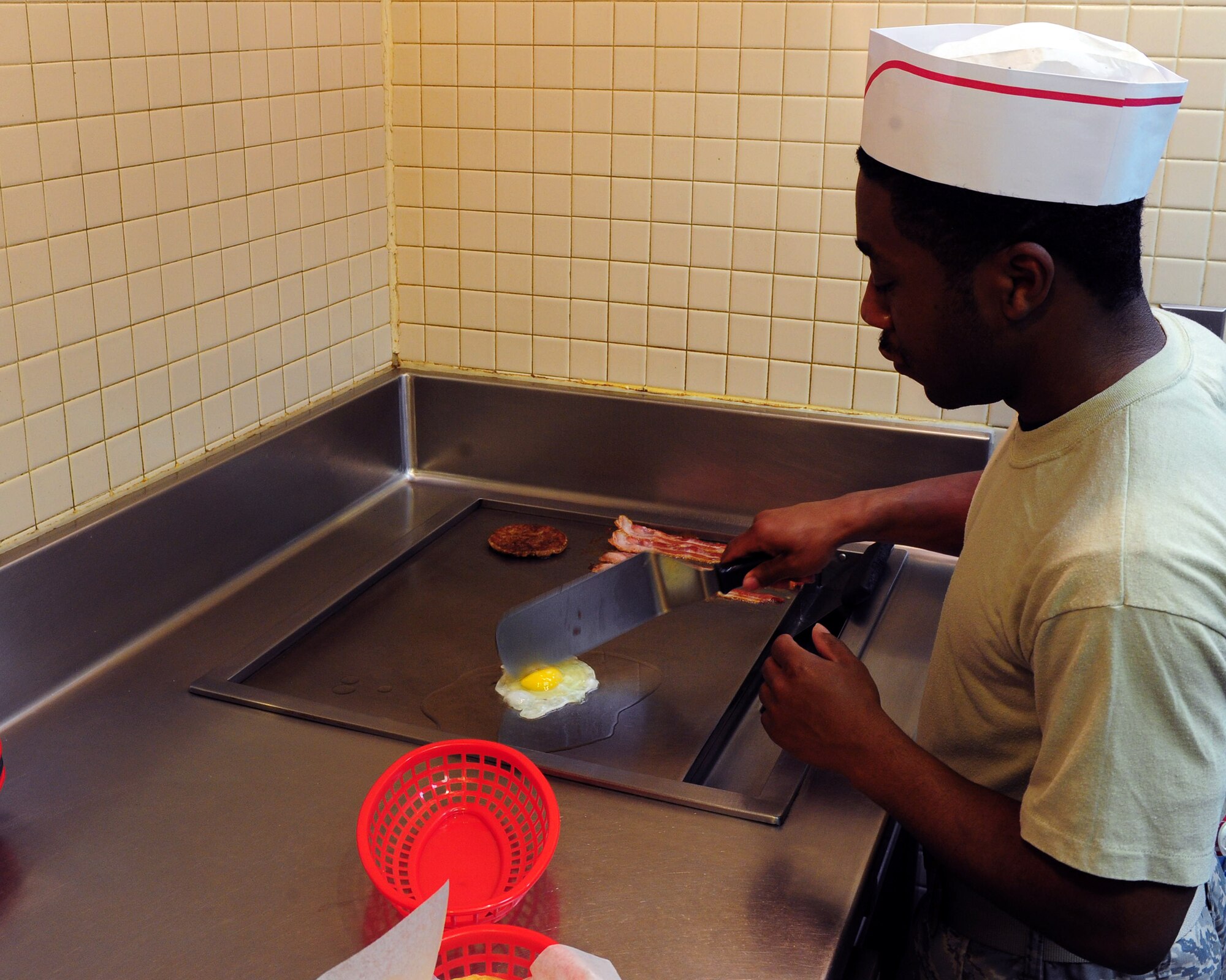MISSILE COMPLEX, N.D. -- 91st Missile Wing chefs are charged with the responsibility of feeding the teams living and working out at missile sites located across the North Dakota plains. These Airmen don’t just cook for their fellow Airmen – they sustain missile field Airmen, create a sense of home, and promote morale through their cooking. It is important to acknowledge just how important the chefs are to the security forces team members, maintainers, facility managers and missile combat crew members out in the missile complexes. (U.S. Air Force photo/Michael J. Veloz)
