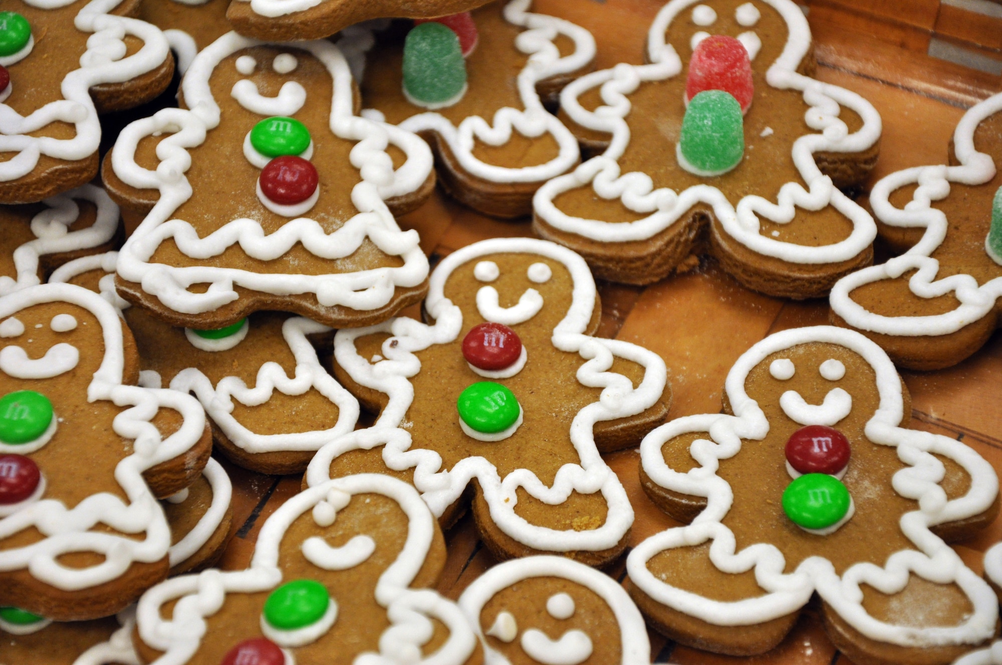 BUCKLEY AIR FORCE BASE, Colo. – Gingerbread men await their fate at the hands of the Cookie Caper volunteers at the Buckley AFB Chapel Dec. 8. Since the start of the Cookie Caper 18 years ago, the program has grown to cover the whole base. (U.S. Air Force photo by Senior Airman Elisa Labbe)