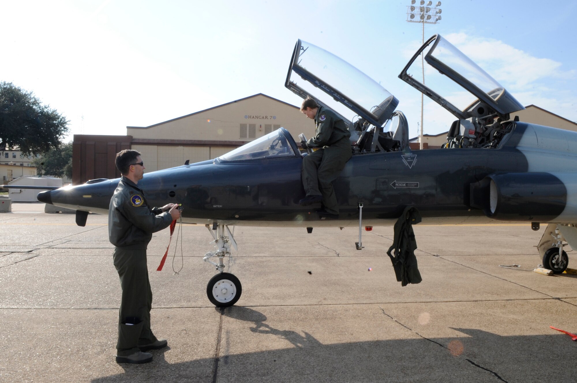 Maj. Robert Faustmann and 2nd Lt. Allie Johnston, 50th Flying Training Squadron from Columbus Air Force Base, Miss., review pre-flight checklists on a T-38C Talon training jet on Barksdale Air Force Base, La., Dec. 9. Checklists are used before, during and after flying to ensure the right procedures are performed while around the aircraft.  (U.S. Air Force photo/2nd Lt. Tori Lalich)(RELEASED)