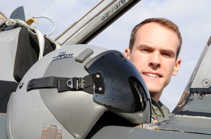 2nd Lt. Christopher Molstad, 50th Flying Training Squadron, settles into the cockpit of a T-38C Talon training jet on Barksdale Air Force Base, La., Dec. 9.  Molstad is a student pilot at Columbus Air Force Base, Miss., and recently received an assignment to Barksdale to become a B-52H Stratofortress pilot. (U.S. Air Force photo/2nd Lt. Tori Lalich)(RELEASED)