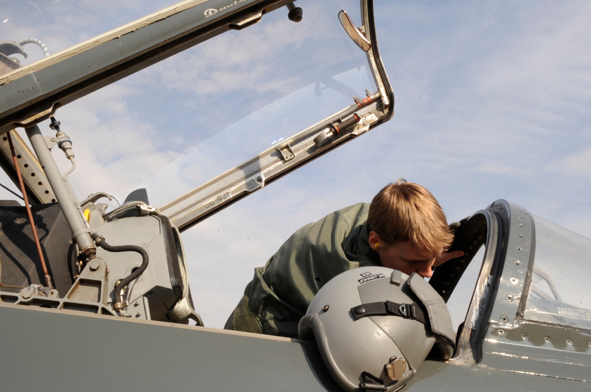 Student pilot 2nd Lt. Allie Johnston, 50th Flying Training Squadron from Columbus Air Force Base, Miss., performs a pre-flight check on a T-38C Talon training jet on Barksdale Air Force Base, La., Dec. 9. With an 11,777-square-foot ramp, the second largest in the Air Force, Barksdale is often used as a landing location for training missions. (U.S. Air Force photo/2nd Lt. Tori Lalich)(RELEASED) 