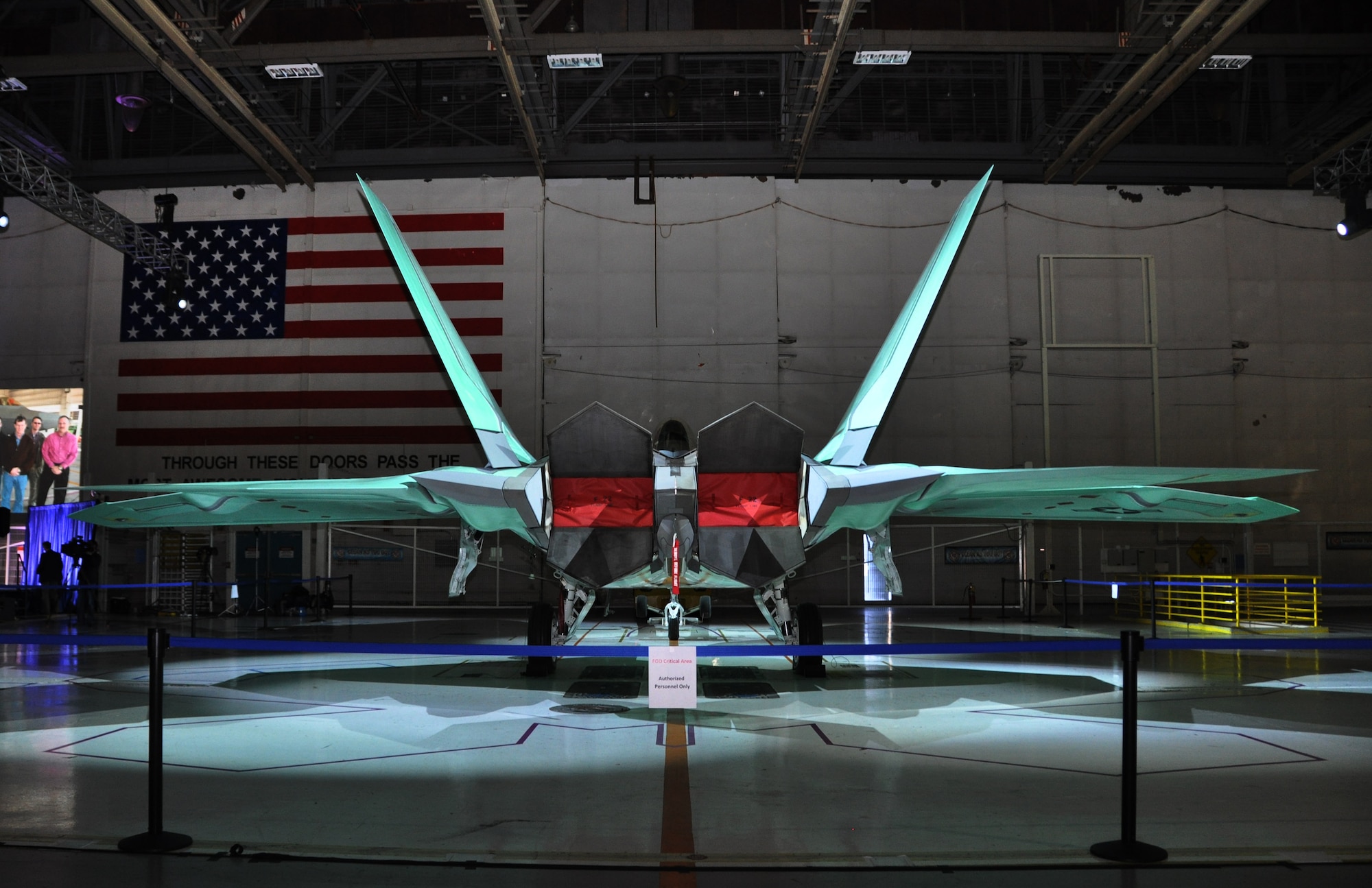 The final F-22 Raptor fighter jet is on display before being rolled off the Lockheed Martin assembly line at a ceremony at the Marietta, Ga. plant Dec. 13.  The jet is the last of 187 F-22s produced for the Air Force completing its operational fleet. (U.S. Air Force photo/ Senior Airman Danielle Purnell)