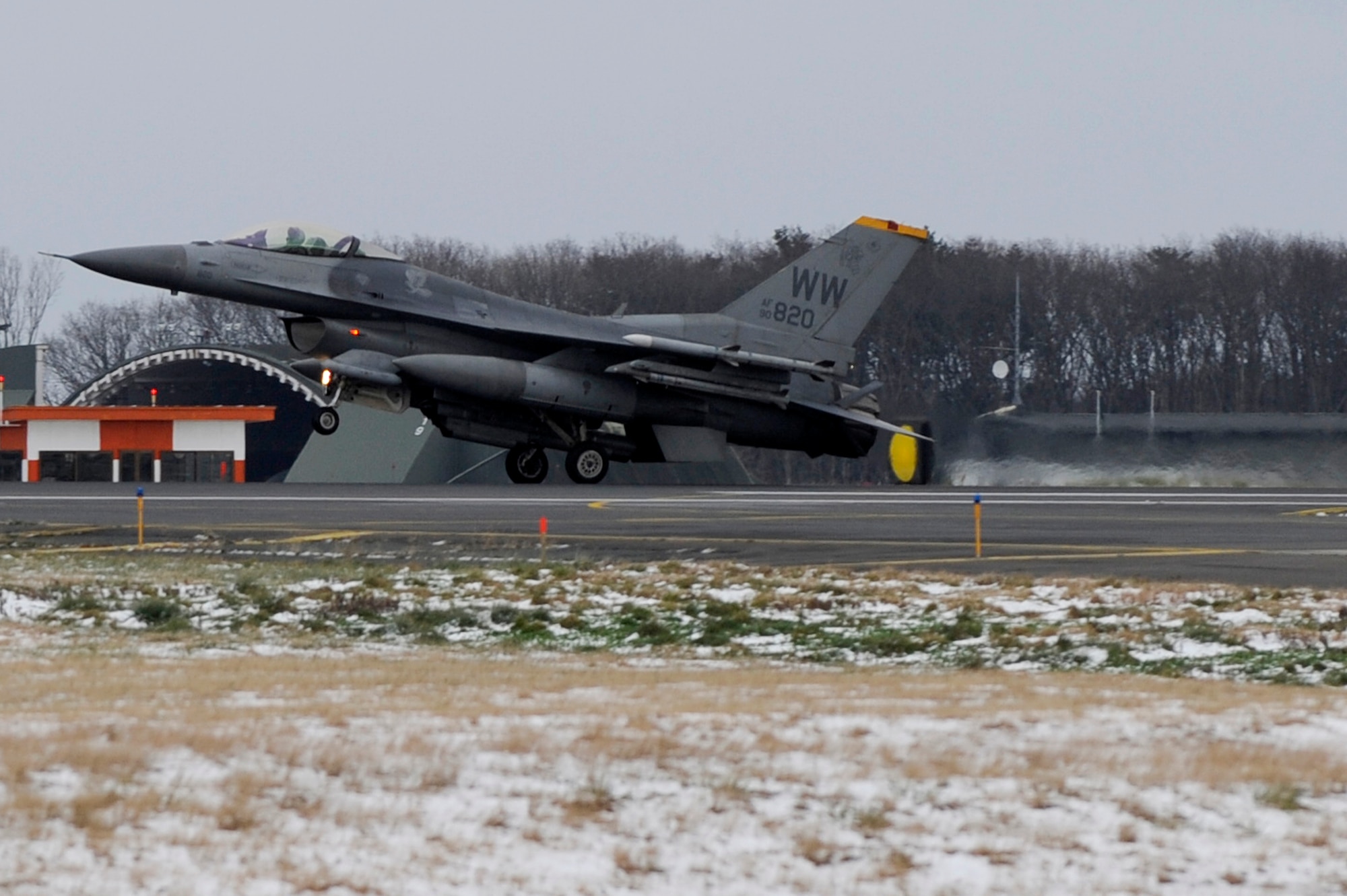 MISAWA AIR BASE, Japan - An F-16 Fighting Falcon from the 14th Fighter Squadron lands here, Dec. 6 after completing a test flight with upgraded systems. Upgrades include a new internal navigation system, computer software and on-board oxygen generating system. (U.S. Air Force photo/Tech. Sgt. Marie Brown)