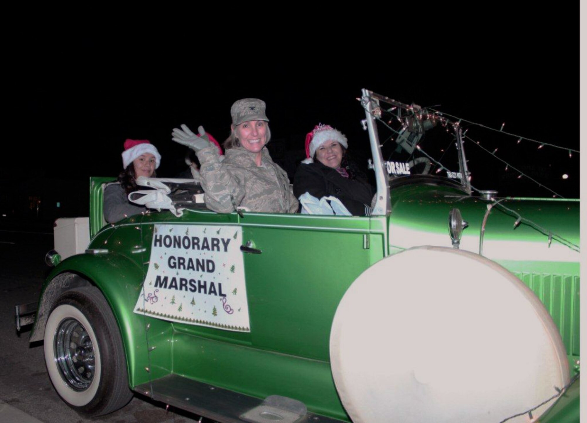 Col. Amy Arwood, vice commander, 95th Air Base Wing, leads the Christmas Parade in Boron Calif. Dec. 10th as the honorary grand marshall. (U.S. Air Force Photo by Meredith Mingledorff) 