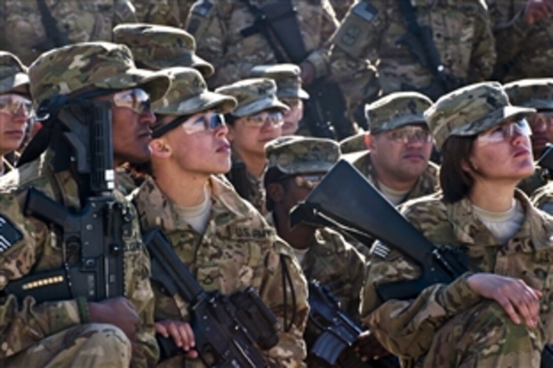 U.S. soldiers listen to U.S. Defense Secretary Leon E. Panetta on Forward Operation Base Sharana, Afghanistan, Dec. 14, 2011. Panetta thanked the soldiers, assigned to the 172nd Infantry Brigade, for their service.