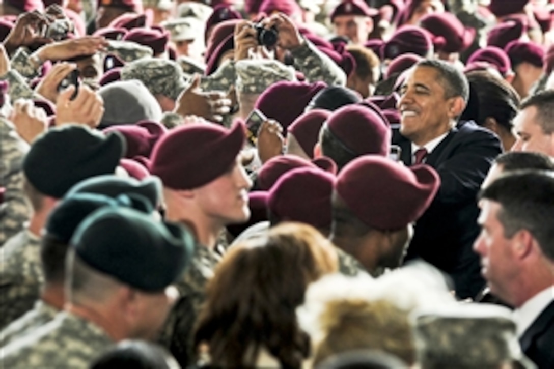 President Barack Obama greets troops on Fort Bragg, N.C., Dec.14, after thanking them for their service during Operation Iraqi Freedom and Operation New Dawn as the Iraq war comes to an end.