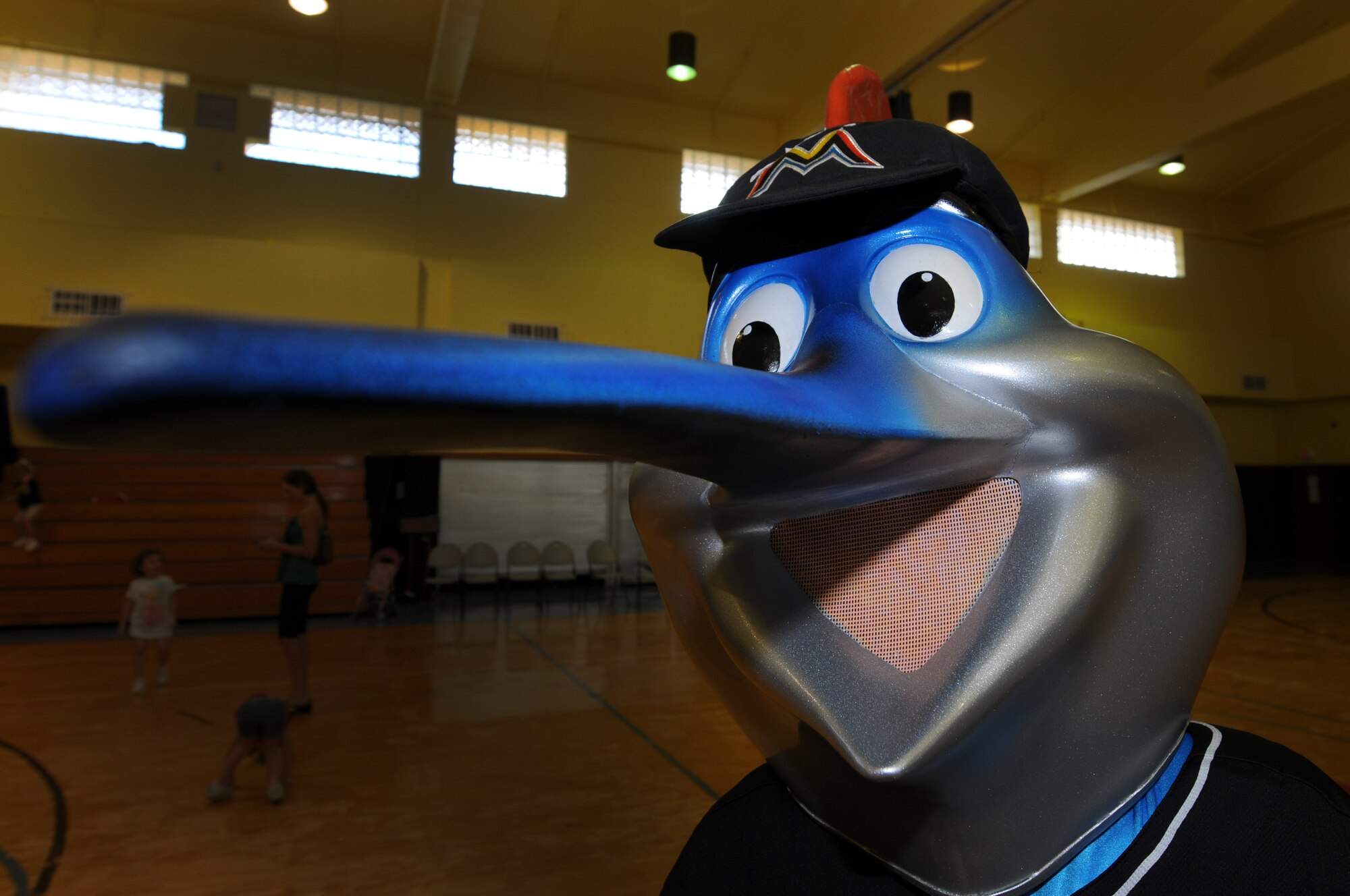 ANDERSEN AIR FORCE BASE, Guam-Billy the Marlin from the Miami Marlins poses for a photo during the dance clinic held at the Youth Center, Dec. 9. The Mermaids taught the children a full dance routine and signed autographs and took pictures. (U.S. Air Force photo/Senior Airman Carlin Leslie)