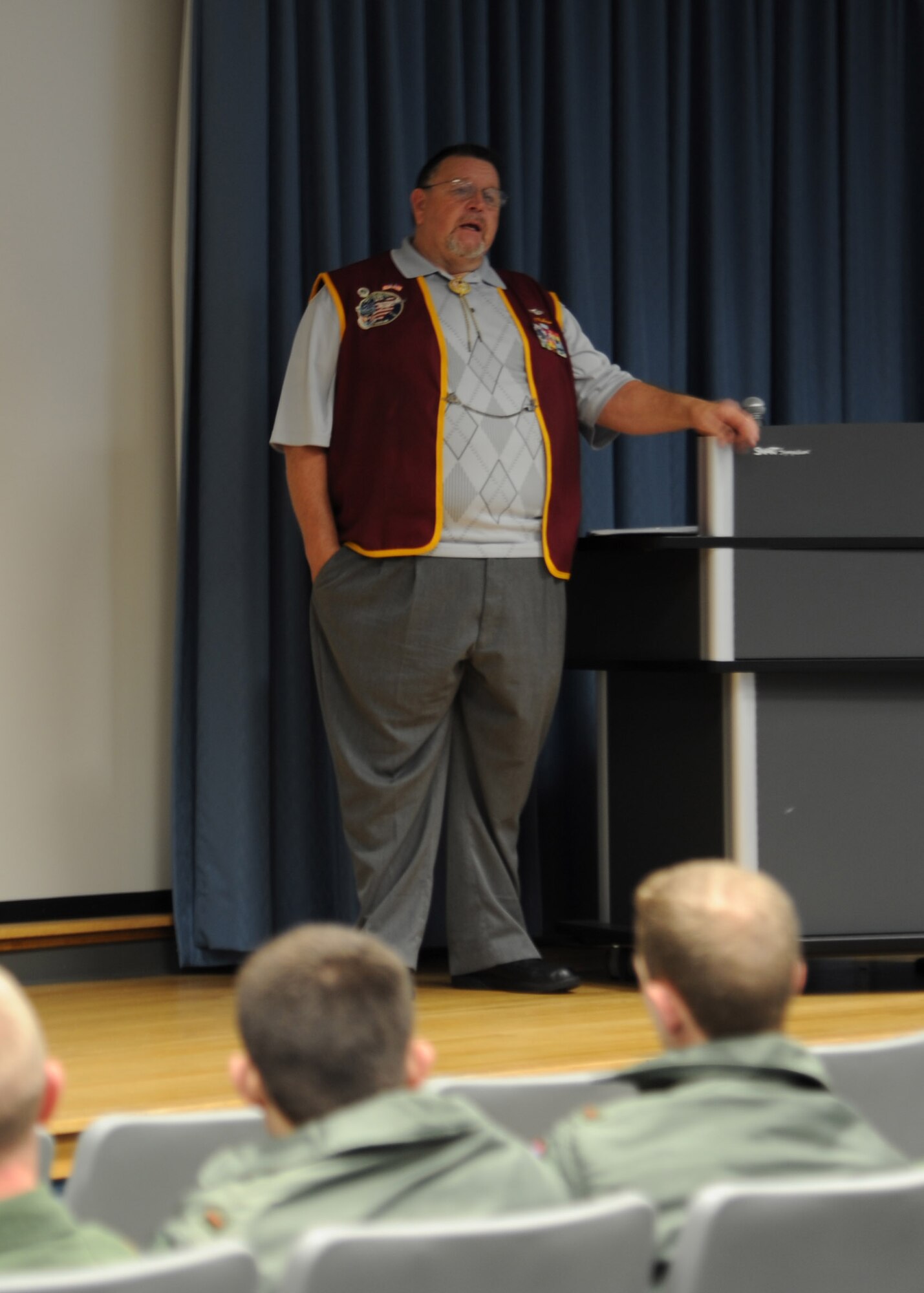 Air Force Capt. Retired Bill Robinson tells his Air Force story to include his experience as a prisoner of war to 80th Flying Training Wing members Dec. 13, 2011, and toured Sheppard Air Force Base, Texas, after attending helicopter maintenance training here nearly 50 years ago. Robinson, a former POW in North Vietnam for seven years, received a direct commission to Lieutenant, received the Air Force Cross, the Silver Star, Legion of Merit, Bronze Star, POW Medal, two Purple hearts and 17 other awards. (U.S. Air Force photo/Senior Airman Adawn Kelsey)