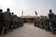 Service members salute while the U.S. national anthem plays during a flag casing ceremony that marked the end of Operation New Dawn, at the former Sather Air Base, in Baghdad, Iraq, on Dec. 15, 2011. Since 2003, more than 1 million Airmen, Soldiers, Sailors and Marines have served in Iraq. (U.S. Air Force photo/Master Sgt. Cecilio Ricardo)