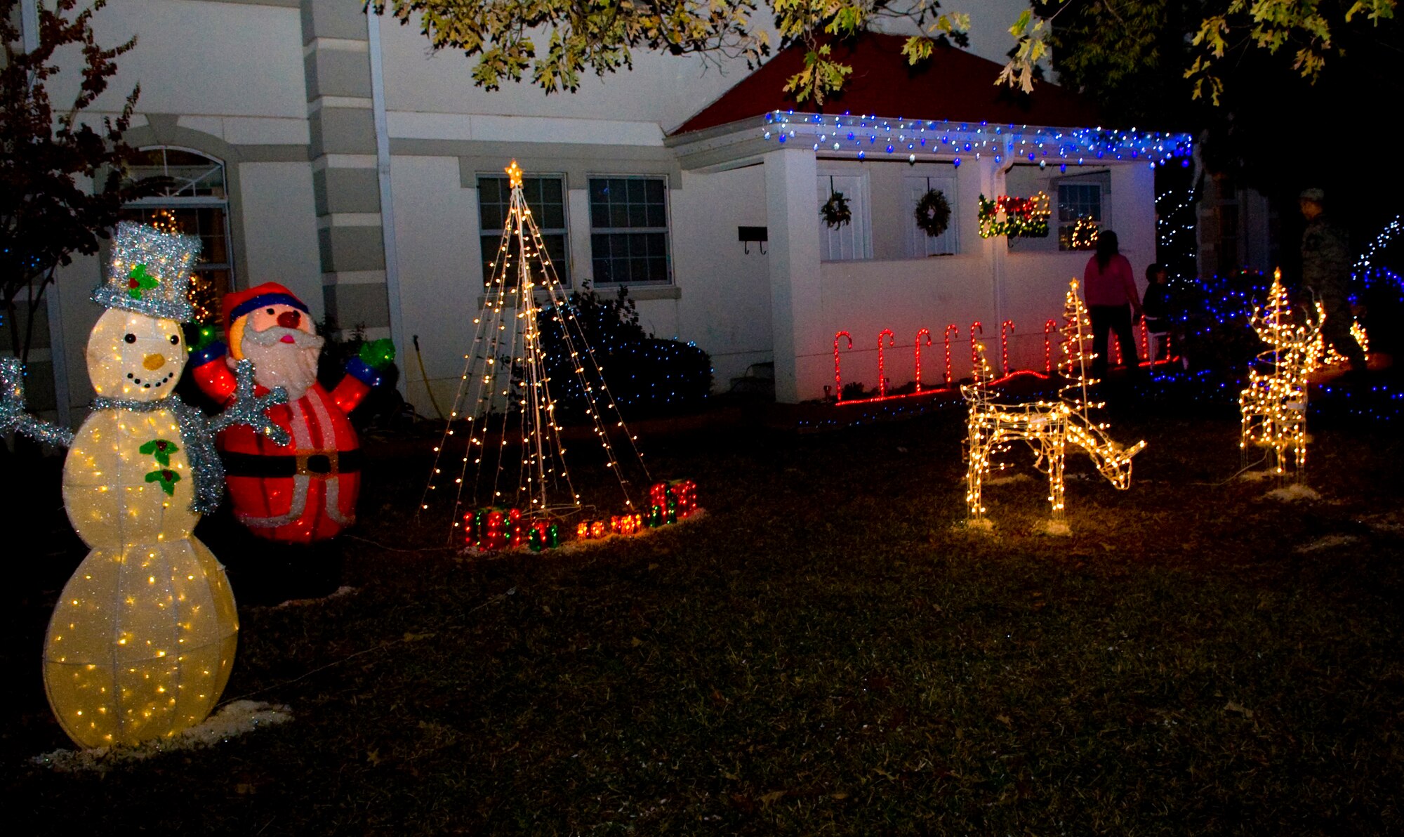 Barksdale homes shine brightly with Christmas decorations on Barksdale Air Force Base, La., Dec. 13. Every year, members of the Barksdale Chief's Group drive around base housing and select the best decorated homes. More than 100 homes were looked at, with two winners selected from the East Side and two from main base. (U.S. Air Force photo/Airman 1st Class Benjamin Gonsier)(RELEASED)