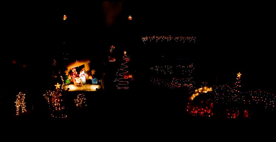 Barksdale homes shine brightly with Christmas decorations on Barksdale Air Force Base, La., Dec. 13. Every year, members of the Barksdale Chief's Group drive around base housing and select the best decorated homes. More than 100 homes were looked at, with two winners selected from the East Side and two from main base. (U.S. Air Force photo/Airman 1st Class Benjamin Gonsier)(RELEASED)