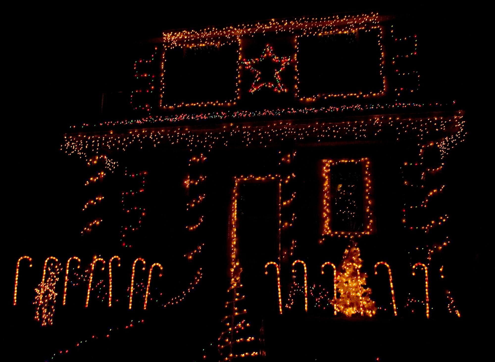 Barksdale homes shine brightly with Christmas decorations on Barksdale Air Force Base, La., Dec. 13. Every year, members of the Barksdale Chief's Group drive around base housing and select the best decorated homes. More than 100 homes were looked at, with two winners selected from the East Side and two from main base. (U.S. Air Force photo/Airman 1st Class Benjamin Gonsier)(RELEASED)