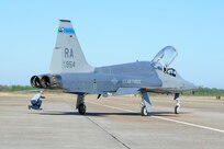 Richard Kilpper, 12th Maintenance Directorate, does a final check before launching a T-38C piloted by Capt. Jeff Shulman, 435th Fighter Training Squadron,at Tyndall Air Force Base, Fla., Dec. 15, 2011.  The 12th Flying Training Wing sent a group of 13 pilots and maintainers and five T-38C Talons from Randolph to Tyndall to assist the 325th Fighter Wing in a training exercise.  (U.S. Air Force Photo by LIsa Norman)