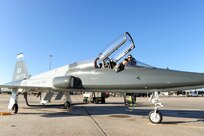 Maj. Jason Earley, 435th Fighter Training Squadron, and Scott Lounsberry, 12th Maintenance Directorate, make final preparations before Earley takes off at Tyndall Air Force Base, Fla., Dec. 15, 2011.  The 12th Flying Training Wing sent a group of 13 pilots and maintainers and five T-38C Talons from Randolph to Tyndall to assist the 325th Fighter Wing in a training exercise.  (U.S. Air Force Photo by LIsa Norman)