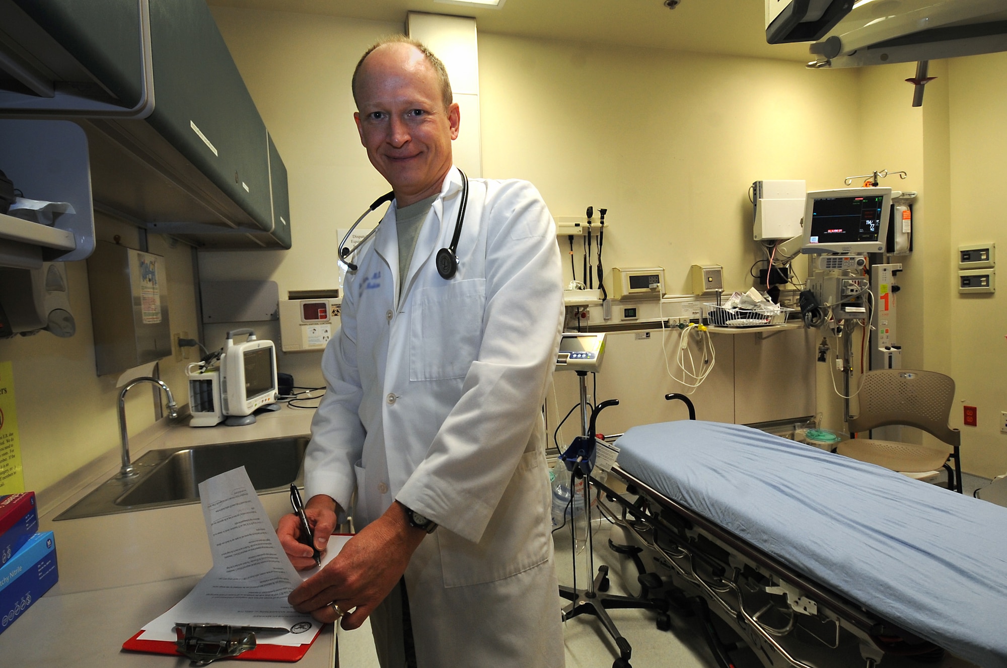 Maj. Richard Weber, 673d Medical Operations Squadron emergency room flight commader, poses for a photo Dec. 8. The ER has many capabilities to serve patients from scraped knees to trauma stabilization. Weber shared how knowing the difference between emergency and non-urgent needs can help you receive the best care for your situation. (U.S. Air Force photo/Staff Sgt. Cynthia Spalding)