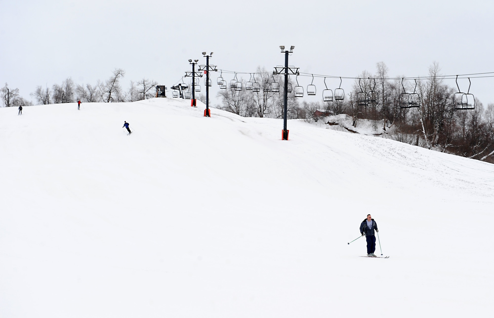 JOINT BASE ELMENDORF-RICHARDSON, Alaska -- Army Col. Timothy Prior, 673d ABW vice wing commander, makes the first trip down the hill to officially start the season at Hillberg Ski Area Dec. 3. Hillberg is now open Friday through Sunday from noon to 8 p.m. (U.S. Air Force photo/Staff Sgt. Cynthia Spalding)