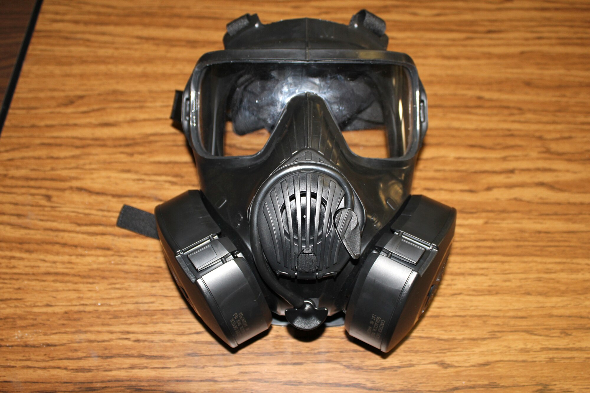 The new M-50 Joint Service General Purpose Mask offers enhanced features such as: lighter weight, larger field of vision, 24 hours of chemical and biological agents protection, self-sealing valve for filter exchange in a contaminated environment, breathing resistance reduction, improved drinking system, extended beard, modular lightweight load-carrying equipment compatible carrier and a service life indicator. Distribution for the mask will start on the January 2012 UTA for members of the 127th Wing, Selfridge Air National Guard Base, Mich. Training will follow the distribution of the mask and be provided by June 2012. (U.S. Air Force photo by 1st Lt. Anthony J. Lesterson)