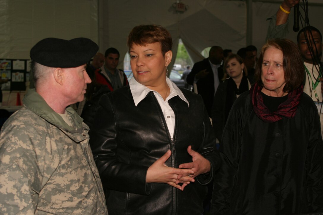 WASHINGTON, D.C. — Maj. Gen. Merdith "Bo" Temple, U.S. Army Corps of Engineers Deputy Commanding General (left), Lisa P. Jackson, EPA Administrator (center), and The Hon. Jo-Ellen Darcy, Assistant Secretary of the Army (Civil Works), share ideas during the EPA Earth Day event on the National Mall here, April 16, 2011. (U.S. Army Corps of Engineers photo by John Hoffman)