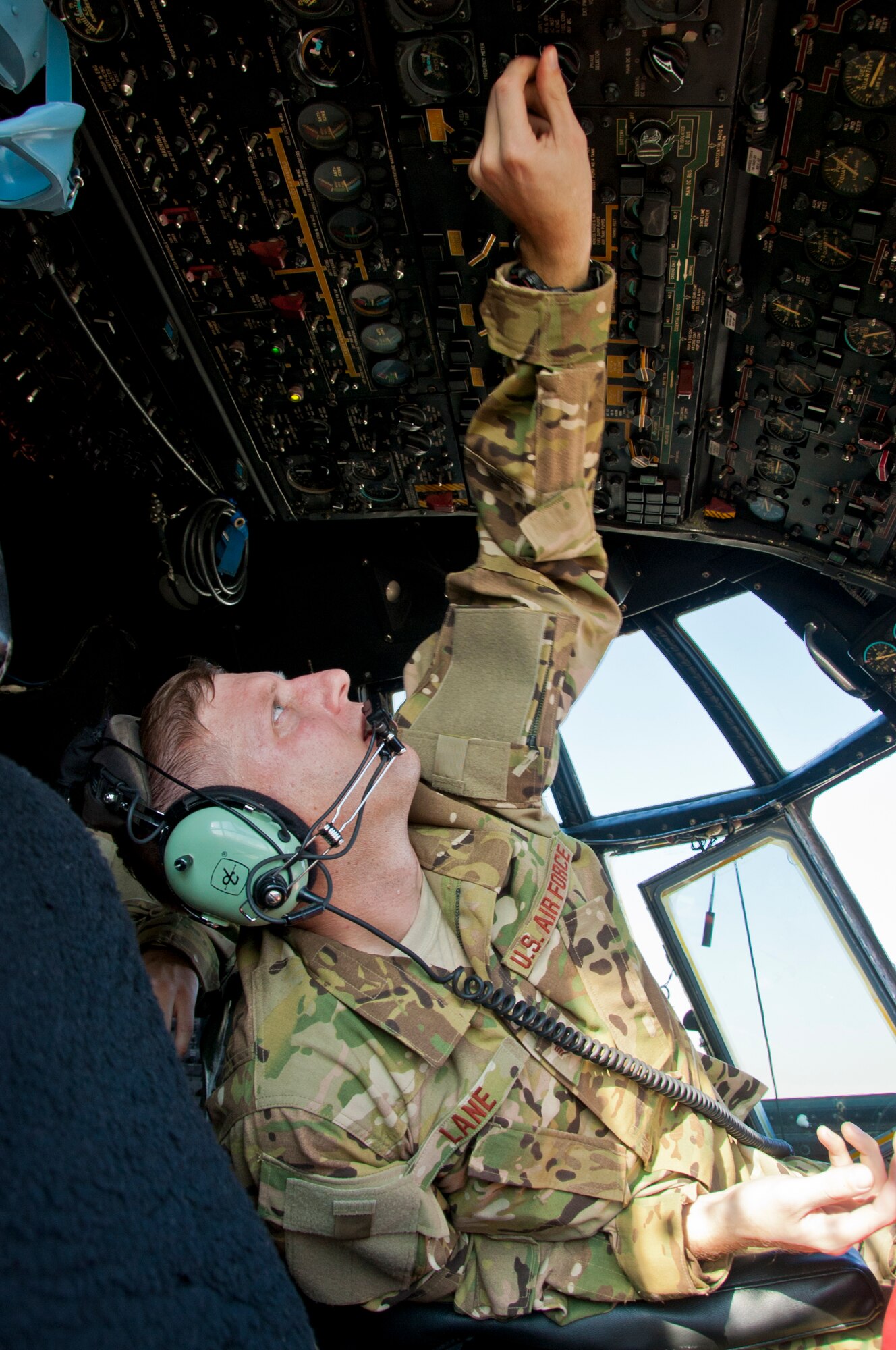 CAMP BASTION, Afghanistan -- Staff Sgt. Jeffrey Lane, 76th Expeditionary Rescue Squadron, performs preflight checks on a HC-130P Combat King at Camp Bastion, Afghanistan, Dec. 14, 2011. Lane is deployed from Moody Air Force Base, Ga.  (U.S. Air Force photo by Staff Sgt. David Carbajal)