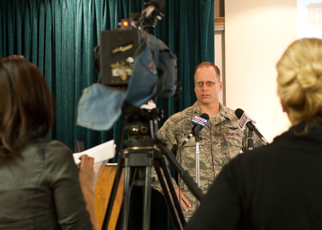 Col. Mark Weatherington, 28th Bomb Wing commander, provides media with an update on future activities at Ellsworth Air Force Base, S.D., Dec. 16, 2011. Weatherington touched on a variety of topics including the MQ-9 mission, housing privatization, and many accomplishments the base had in 2011. (U.S. Air Force photo by Airman Alystria Maurer/Released)