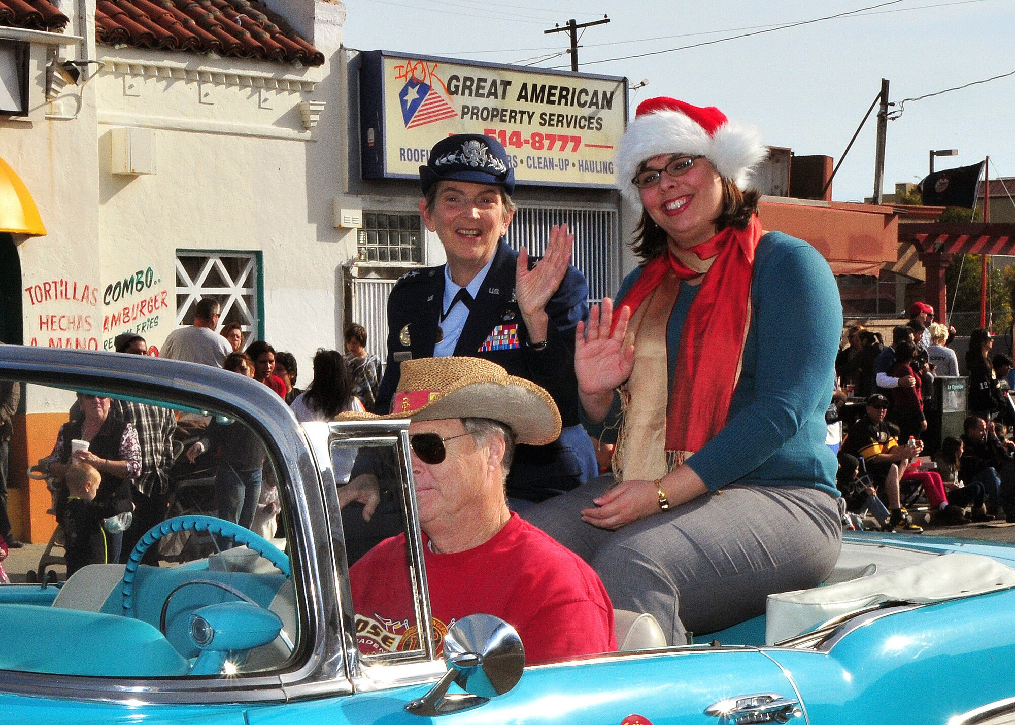 Lt. Gen. Ellen Pawlikowski, Commander, Space and Missile Systems Center, Los Angeles Air Force Base, Calif., and daughter Jennifer participated in the 31st Annual Spirit of San Pedro Holiday Parade in San Pedro, Calif., Dec. 4, 2011. (U.S. Air Force Photo by Lou Hernandez)  