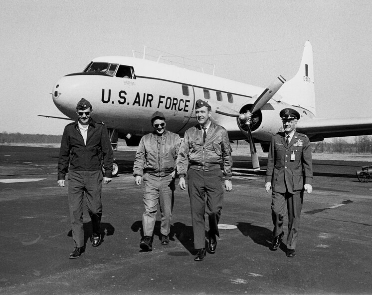 From left, Maj. Kent Monroe, a test director in AEDC’s Engine Test Facility and co-pilot for the flight; an unidentified crew member; John Stubbs, retired deputy general manager of Schneider Services International (SSI) and the T-29 flight commander; and then Lt. Col. Hugh Killingsworth, Arnold’s operations officer, pose for an informal portrait photo. (AEDC File Photo)
