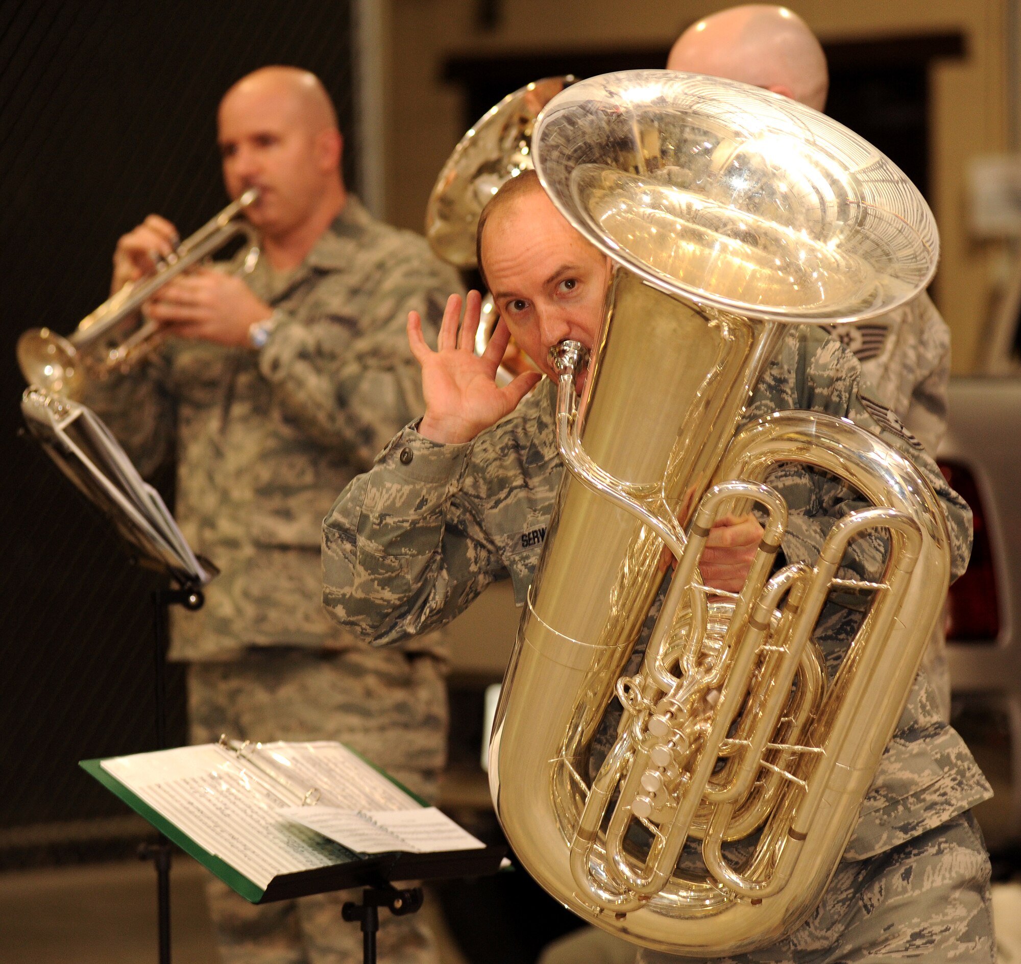 U.S. Air Force Tech. Sgt.  Alex Serwatowski, member of the Heartland of America Band, plays for members of the 319th Communications Squadron on Dec. 16 at Grand Forks Air Force Base, N.D.  Based out of Offutt Air Force Base, Neb., the band travels to various bases during the holiday season to promote morale amongst Airmen. (U.S. Air Force Photo by Airman 1st Class Xavier Navarro)
