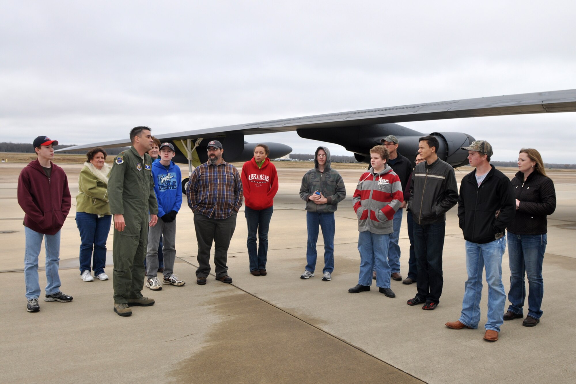 Maj. Michael Stratton, the executive officer for the 307th Bomb Wing, explains the capabilities of the B-52 Stratofortress to a group of home-schooled kids from Texarkana, Ark., during their tour of Barksdale Air Force Base, La., Dec. 16, 2011. The 307th BW conducts more than 200 familiarization tours a year for local schools, civic leaders and organizations, political dignitaries and members of sister services. (U.S. Air Force photo by Master Sgt. Jeff Walston/Released)  