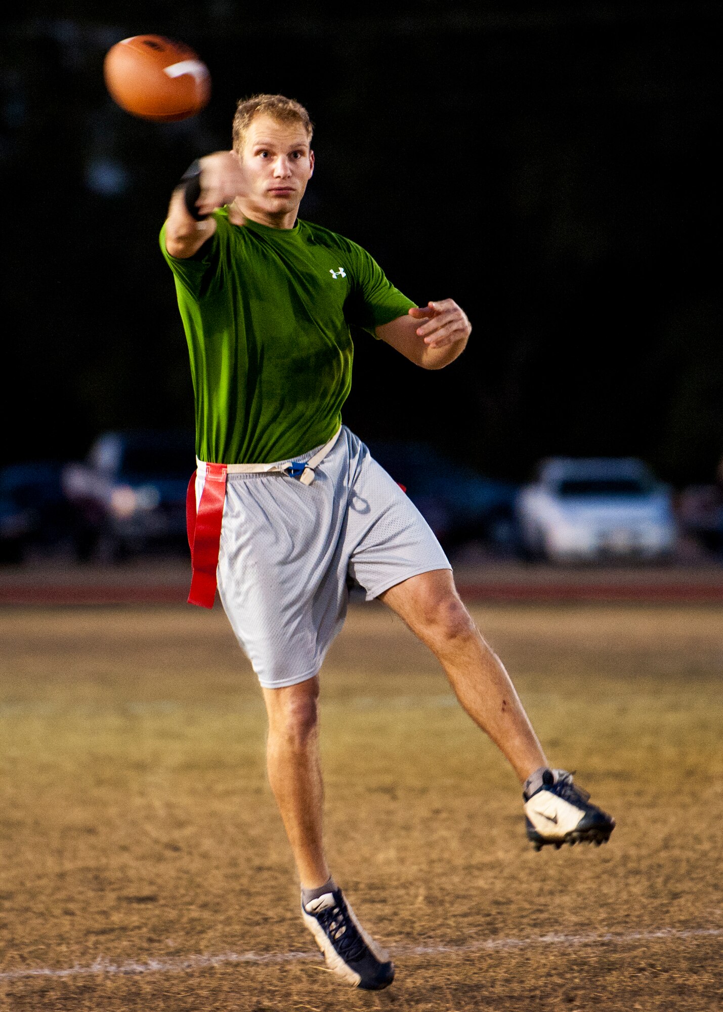 Jimmy Herold, Air Armament Center coach, tosses a pass to an open teammate during the base intramural flag football championship game against the 96th Security Forces Squadron Dec. 15 at Eglin Air Force Base, Fla.  SFS beat the Air Armament Center team 19-14 to claim the title.  It had been three years since they’d been the champs.  (U.S. Air Force photo/Samuel King Jr.)