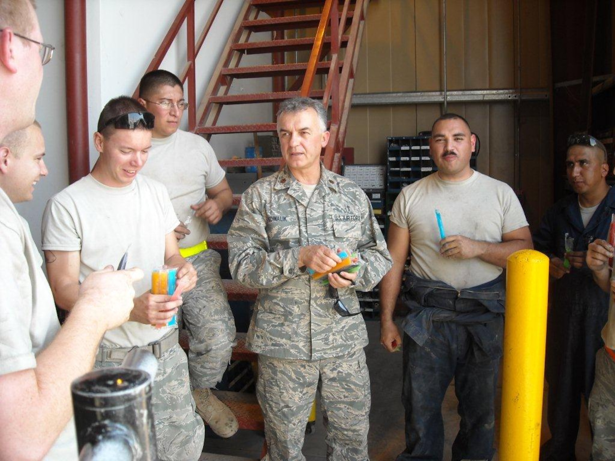 Chaplain (Maj.) Jacek Kowalik, 332nd Air Expeditionary Wing Catholic priest, visits with Airmen assigned to the 332nd AEW Oct. 17, 2011 at Joint Base Balad, Iraq. Kowalik is a native of Parszow, Poland and is deployed from Spangdahlem Air Base, Germany. (U.S. Air Force photo by Tech. Sgt. Jonathan Meier)