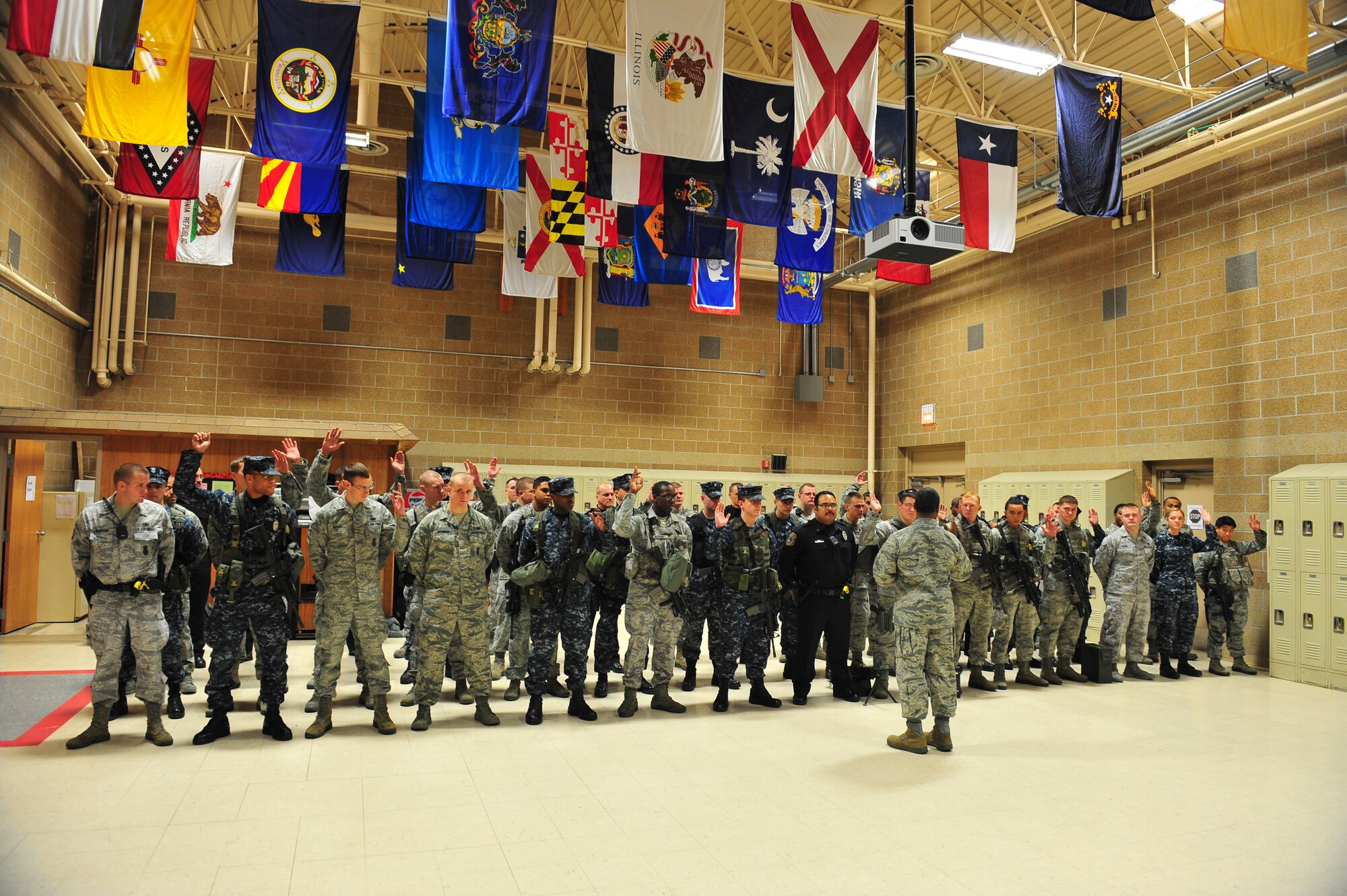U.S. Air Force Brig. Gen. Jimmy McMillian, Air Force director of Security Forces, asks a flight of 55th Security Forces Squadron personnel a question during a briefing held in the 55th Security Forces Squadron bldg. on Offutt Air Force Base Neb., Dec. 07. McMillian leads more than 30,000 active-duty and reserve worldwide.

(U.S. Air Force photo by Charles Haymond/Released).  