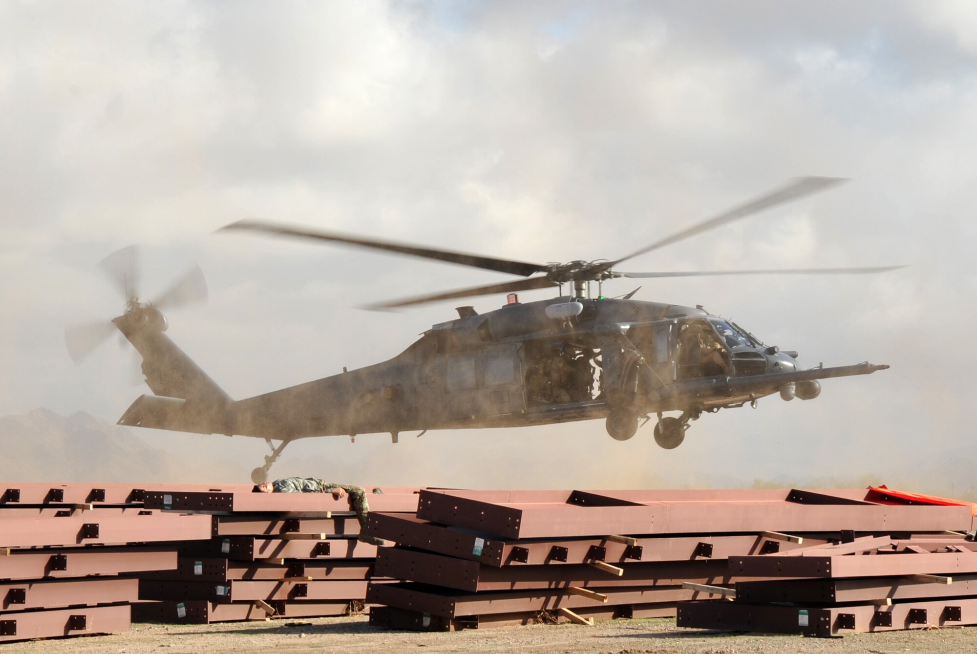 An HH-60G Pave Hawk helicopter with the 943rd Rescue Group prepares to land and drop off pararesucemen during a mass causality drill during Operation Shocker training exercise. The exercise tested the 943rd Rescue Group’s ability to respond to a variety of combat-search-and-rescue scenarios prior to an upcoming deployment. (U.S. Air Force photo/ Master Sgt. Luke Johnson)