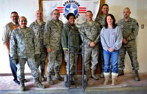 MINOT AIR FORCE BASE, N.D. -- Milt Arneson, Home Depot executive and Amy Palmer, Operation Homefront chief operating officer, pose with the Team Minot First Sergeants who volunteered in support of Operation Homefront here Dec. 15. Operation Homefront was a charitable initiative headed by the Home Depot Foundation, in coordination with Minot AFB’s Operation Warm Heart and General Electric, which donated more than 130 appliances to Team Minot Airmen and their families affected by the historic Souris River flood. (U.S. Air Force photo/Senior Airman Desiree Esposito)