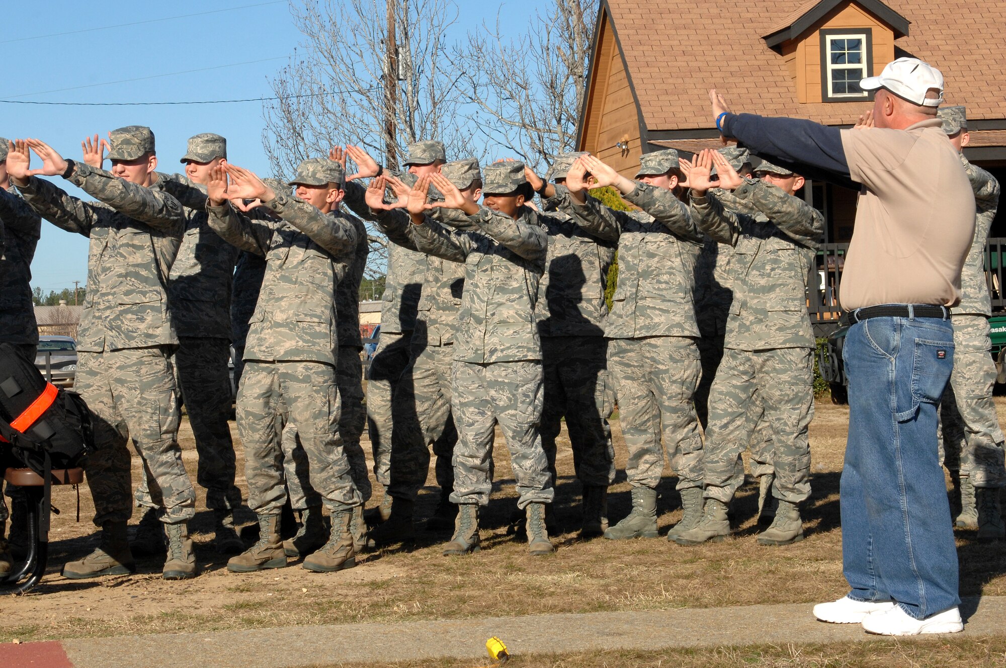 U.S. Air Force Airmen determine their dominant eye at the trap and skeet shooting range during their First Term Airman Course at Shaw Air Force Base, S.C., Dec. 13, 2011. The FTAC class is a program in which new Airmen explore what their new base has to offer. (U.S. Air Force photo by Airman First Class Blake Hubbard/Released)