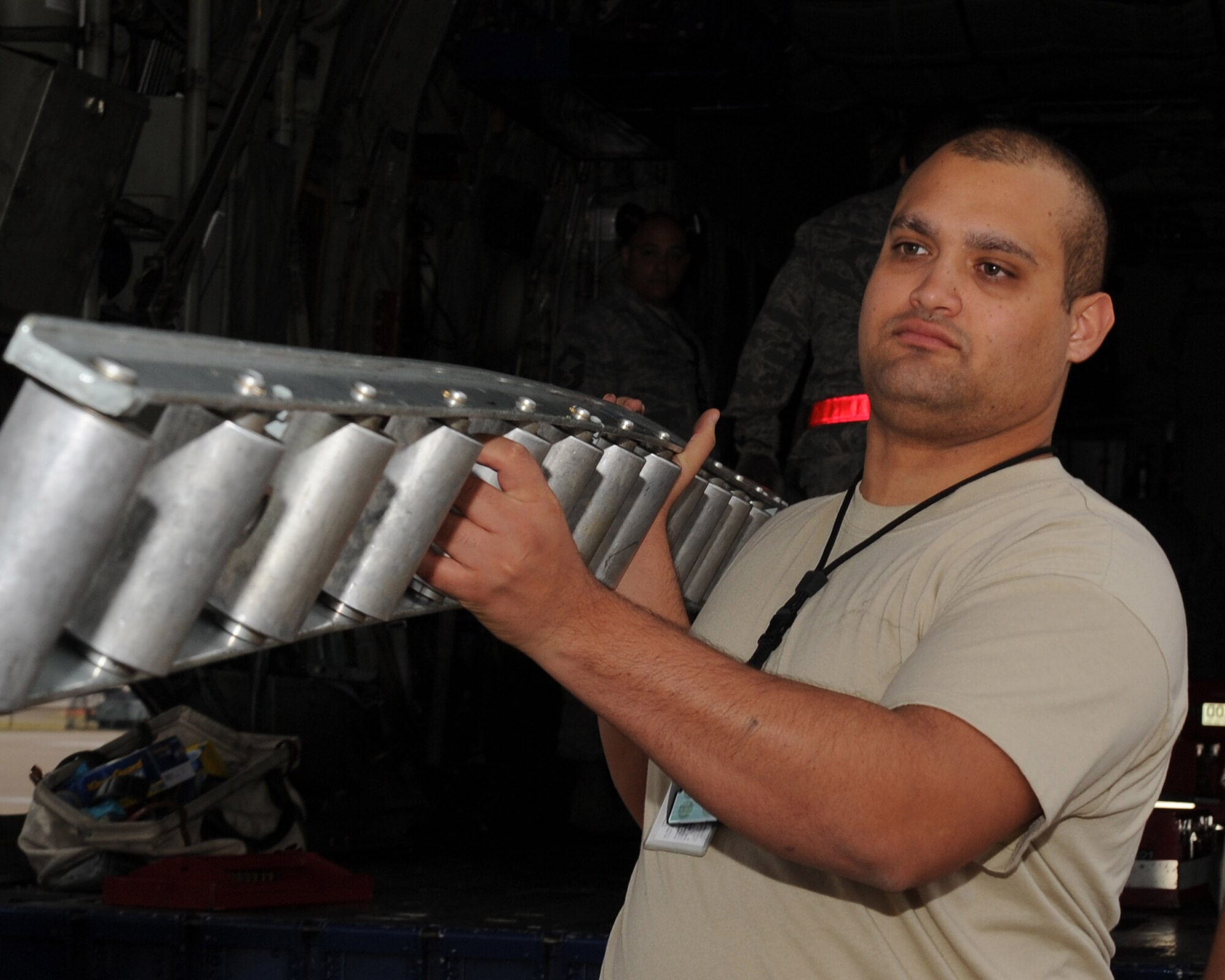 Senior Airman Michael Albert, a 314th Aircraft Maintenance Squadron dual rail specialist, removes a section of the cargo rail system from the Blue Angels C-130T Hercules nicknamed “Fat Albert” Dec. 16, 2011, at Little Rock Air Force Base, Ark. The 314th duel rail shop has worked on “Fat Albert” for over 10 years preparing the aircraft for the team’s demonstration season.   The Blue Angels will headline the open house and air show at Little Rock AFB scheduled for Sept.  8 and 9. (U.S. Air Force photo by Tech. Sgt. Chad Chisholm)