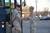 Col. Randy Ogden (right), 916th Air Refueling Wing commander welcomes reservists from the 916th Security Forces on their return home from Afghanistan. Nearly a dozen defenders returned to Seymour Johnson on Dec. 16, 2011. (USAF photo by SSgt. Terrica Jones, 916ARW/PA)