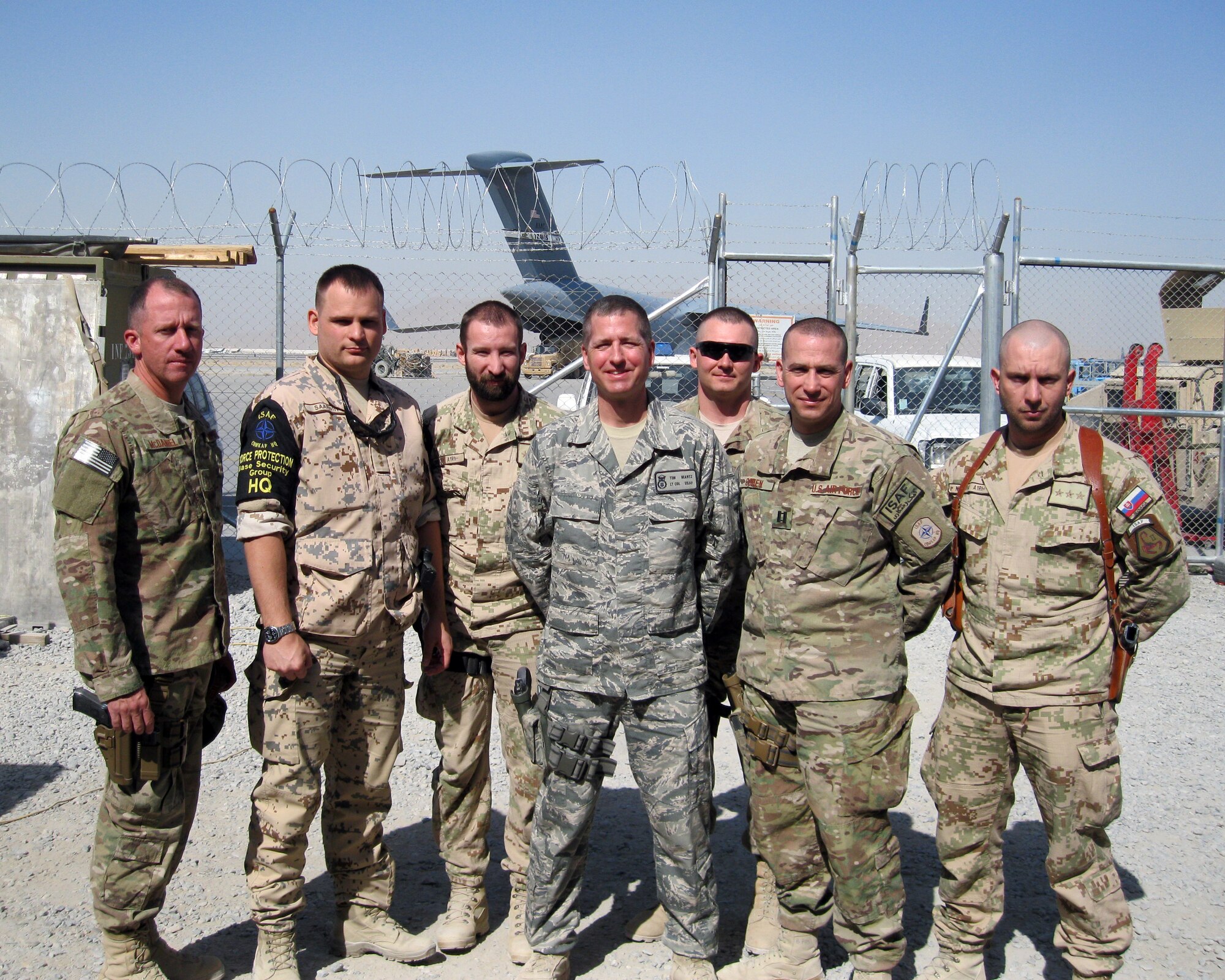 Lt. Col. Timothy Martz poses with members of his staff during his recent deployment to Kandahar Airfield.  While deployed, Martz was awarded the Bronze Star Medal for Meritorious Service. (U.S. Air Force photo/ Senior Airman Danielle Purnell)
