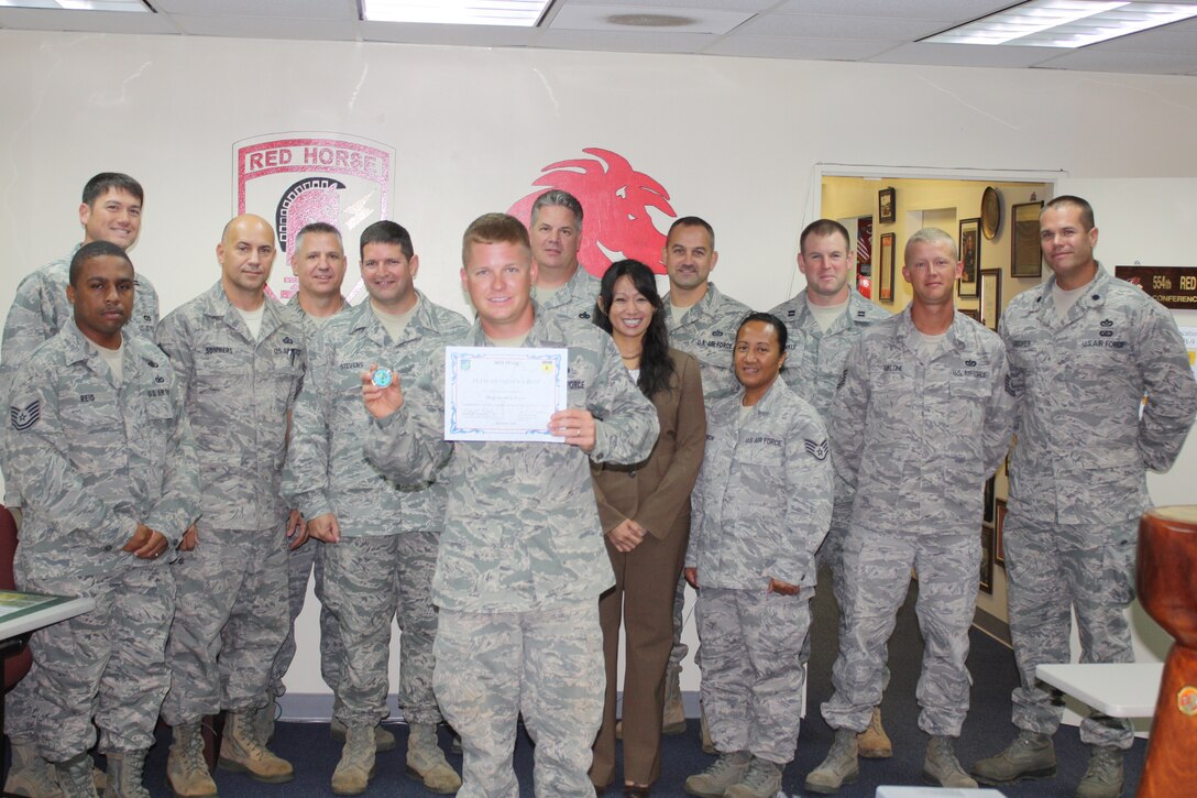 Staff Sgt. Jarrett J. Boyd, 554th REDHORSE structural craftsman, was awarded Team Andersen’s Best, Dec. 13.  Andersen’s Best is a recognition program which highlights a top performer from the 36th Wing. Each week, supervisors nominate a member of their team for outstanding performance and the wing commander presents the selected Airman/Civilian with an award. (U.S. Air Force photo/Senior Airman Carlin Leslie